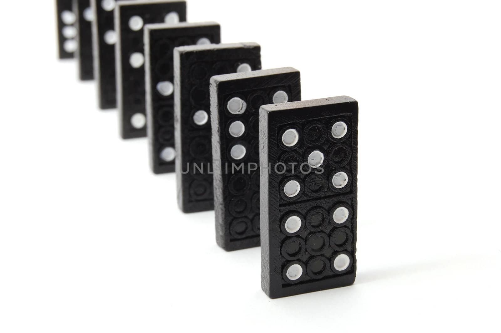 chain of dominoes isolated on a white background