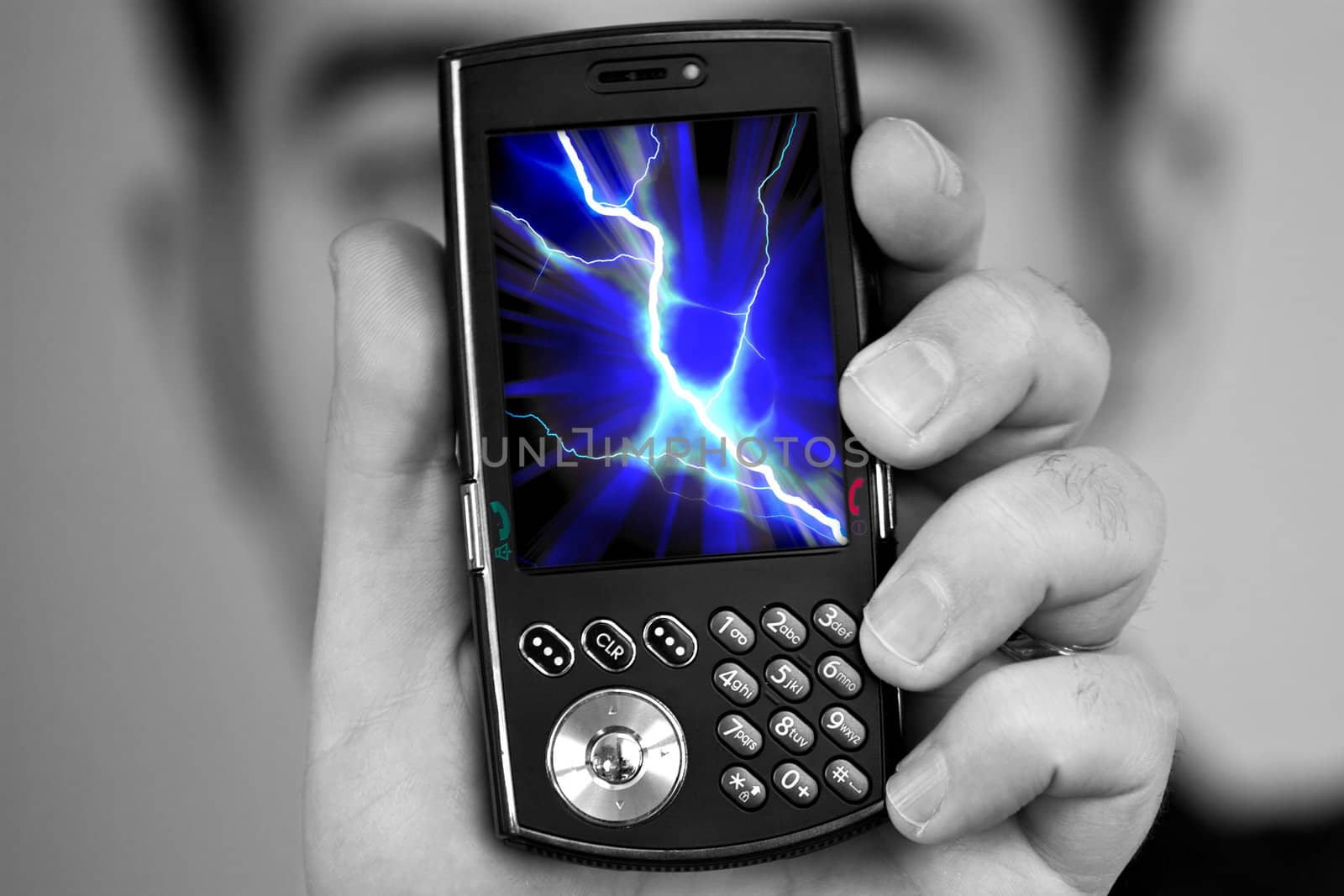 A man holds a cell phone with a lightning bolt illustration on the screen.  Great image to illustrate cell phone radiation.