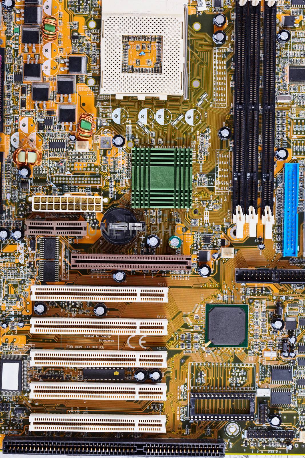 The computer old motherboard photographed close up