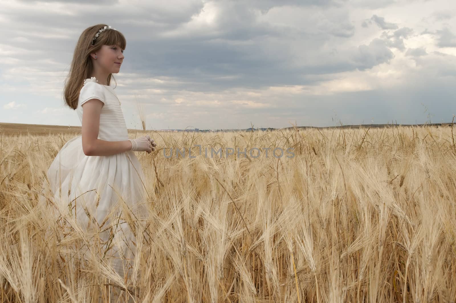 communion dress girl in the field