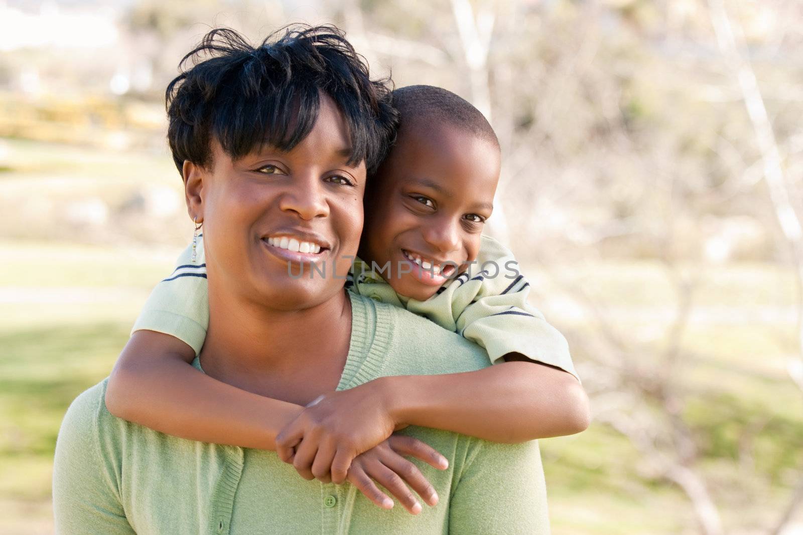 Happy African American Woman and Child by Feverpitched