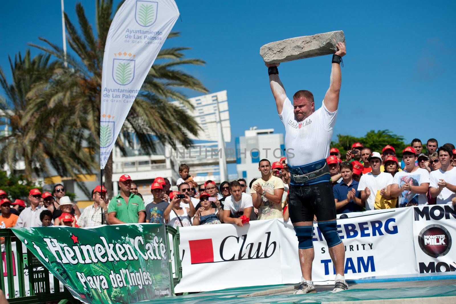 CANARY ISLANDS – SEPTEMBER 03: Lauri Nami from Estonia lifting a heavy stone during Strongman Champions League in Las Palmas September 03, 2011 in Canary Islands, Spain
