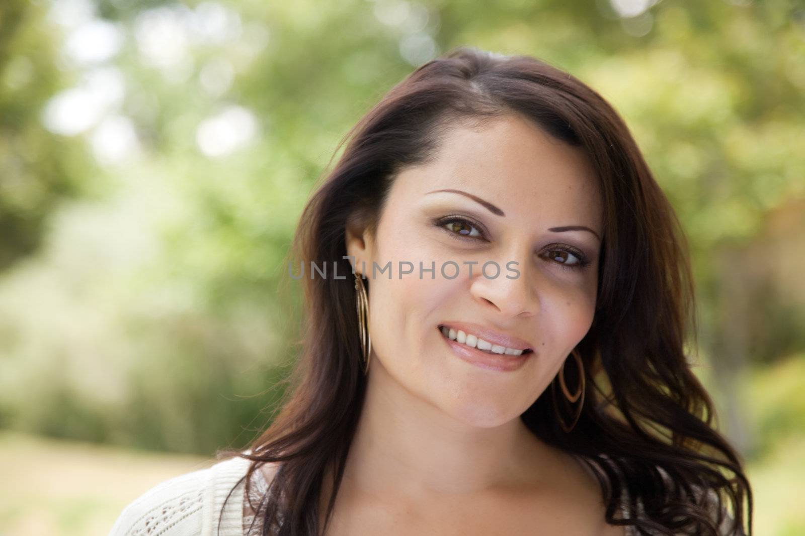 Attractive Hispanic Woman Portrait in the Park.