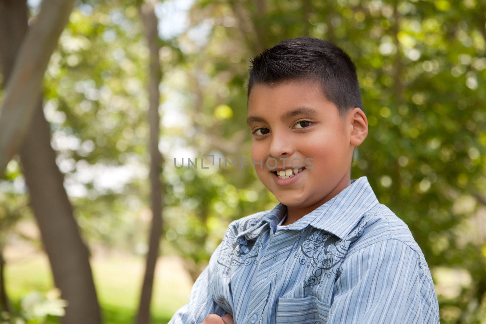 Handsome Young Hispanic Boy Having Fun in the Park.