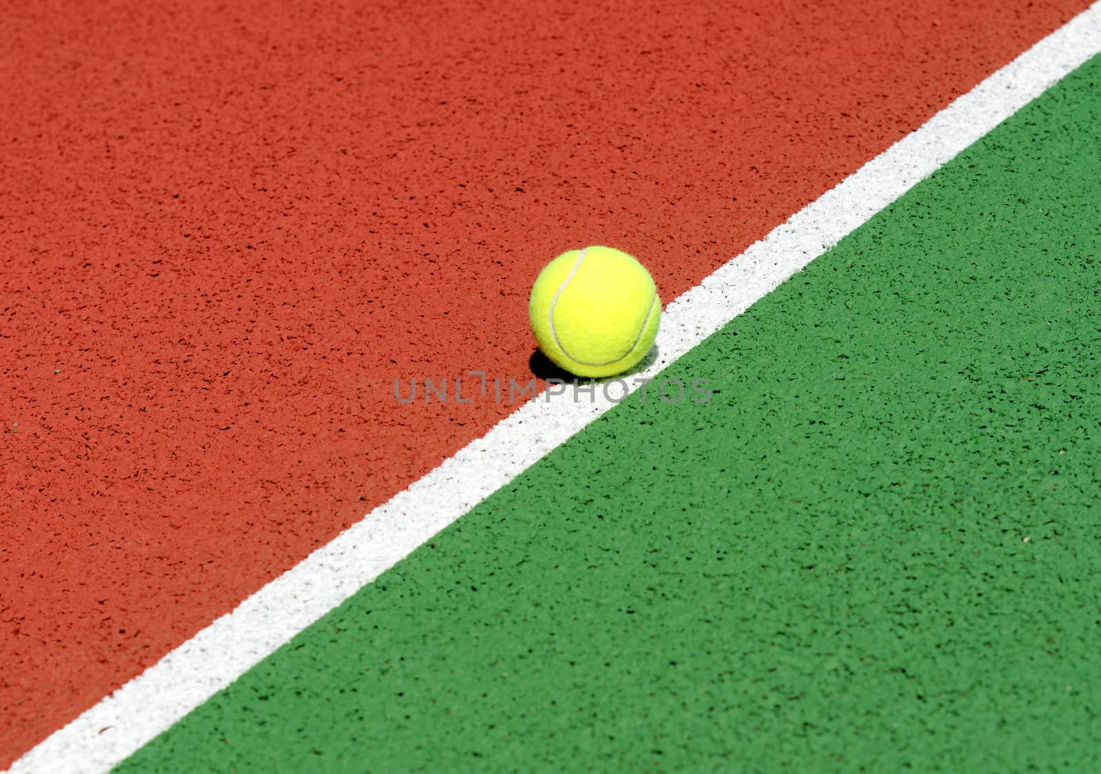 Tennis ball on a tennis court
