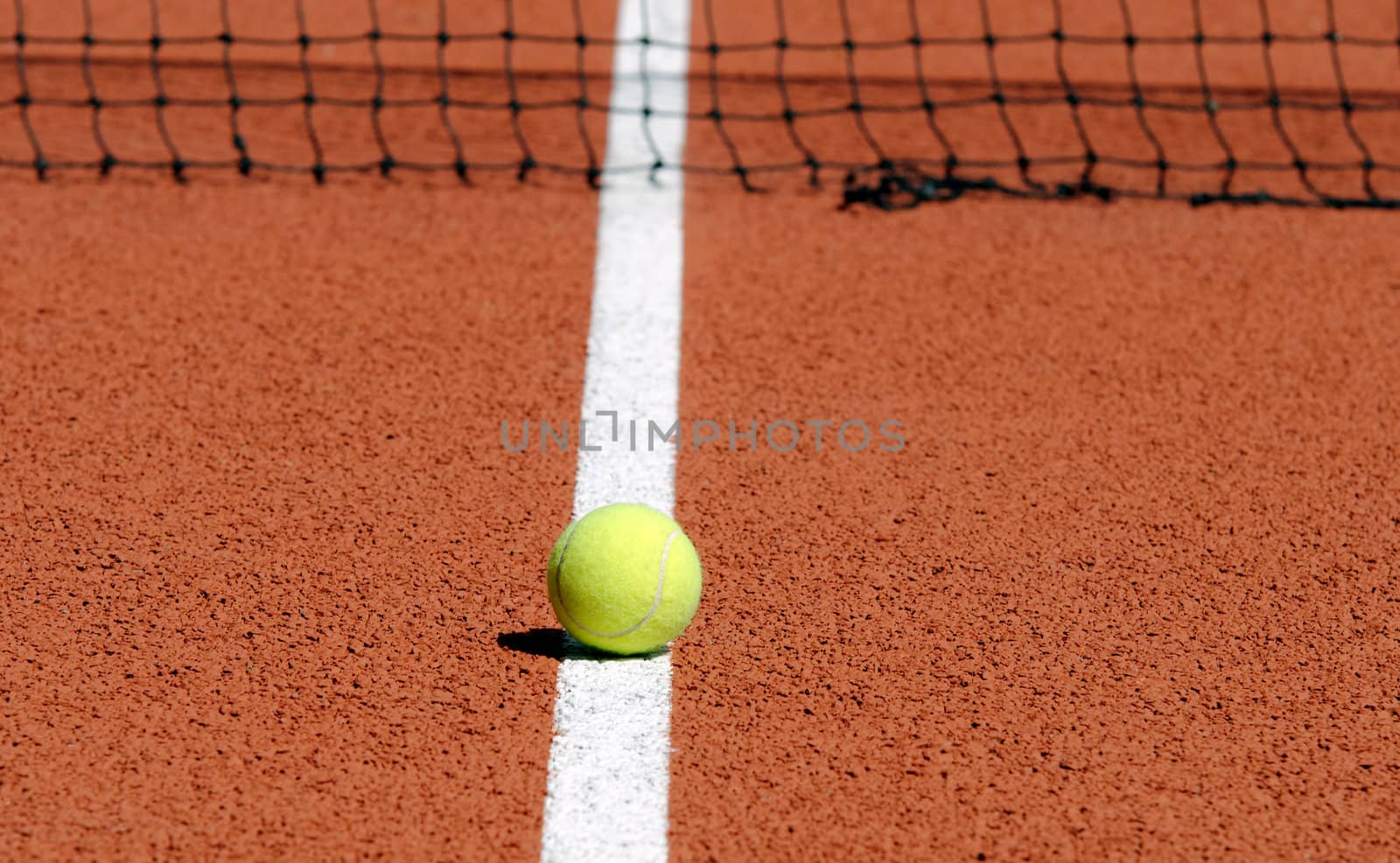 Tennis ball on a tennis court
