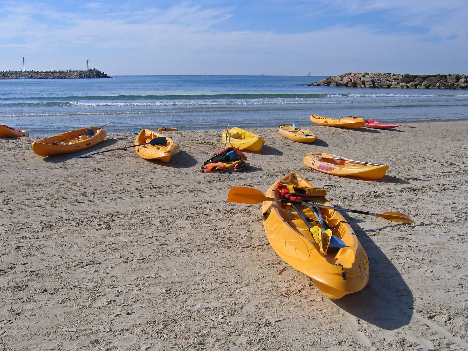 Sea kayaks on the beach ready for action