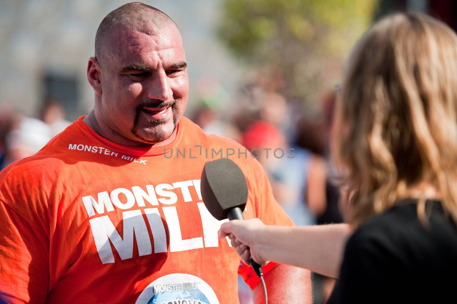CANARY ISLANDS - SEPTEMBER 03: Ervin Katona from Serbia, with highest score, being interviewed during Strongman Champions League in Las Palmas September 03, 2011 in Canary Islands, Spain