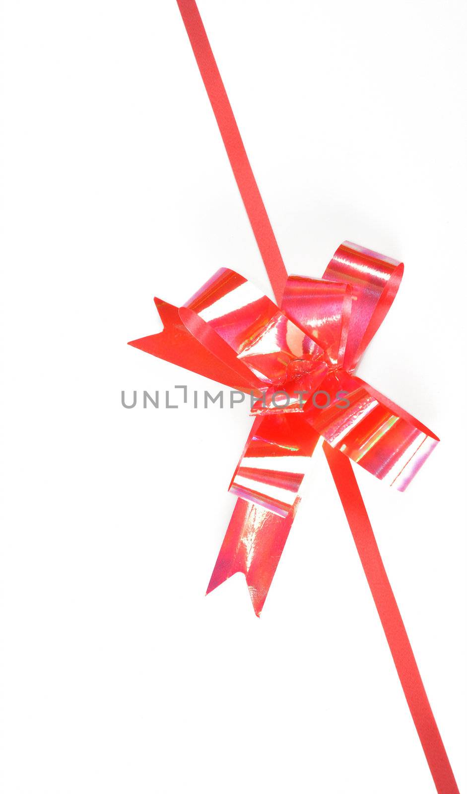 close up of red ribbon on white background on white background