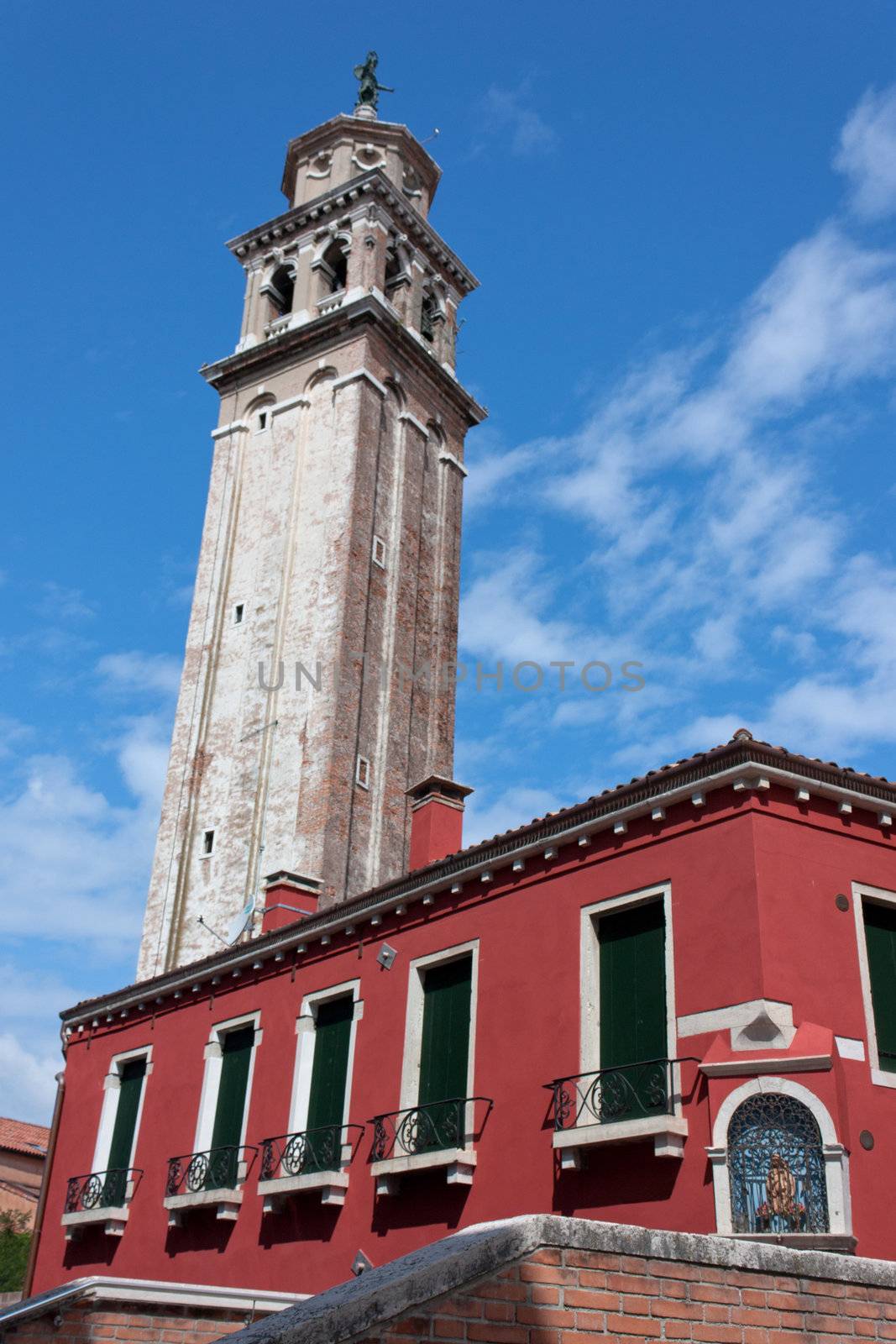 House and Bell tower in Venice - Italy