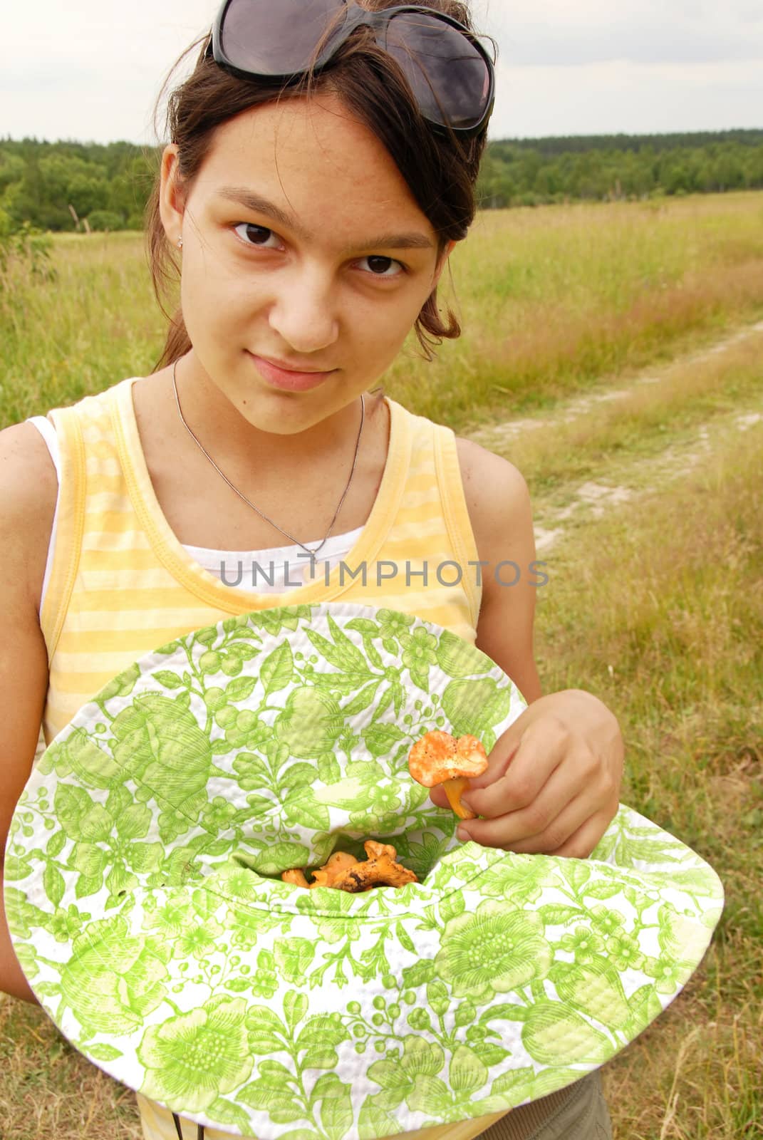 Teenage girl with mushrooms by simply