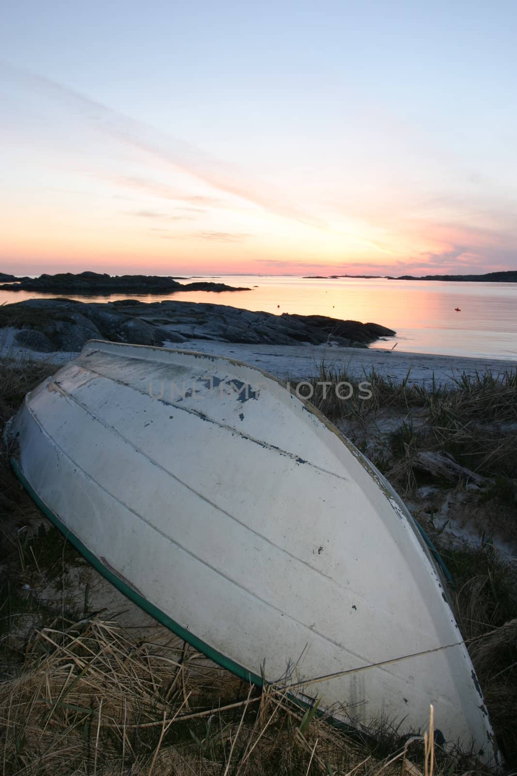Rowboat at the beach by Einar