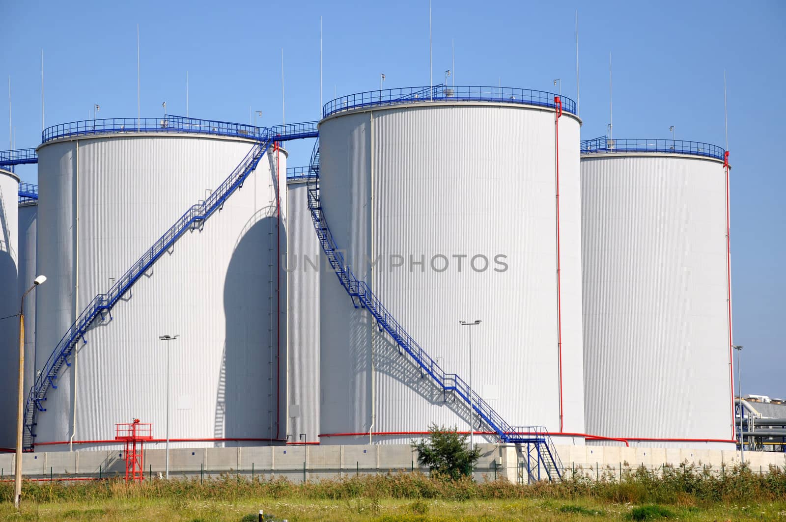 Greater white fuel tanks on a background of the blue sky