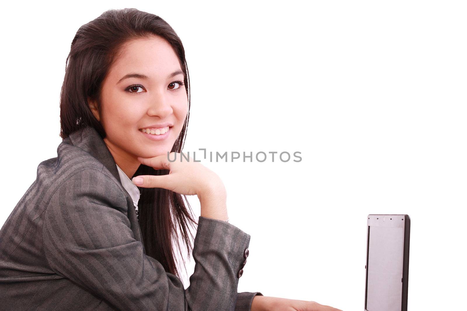 beautiful smiling business woman working on laptop