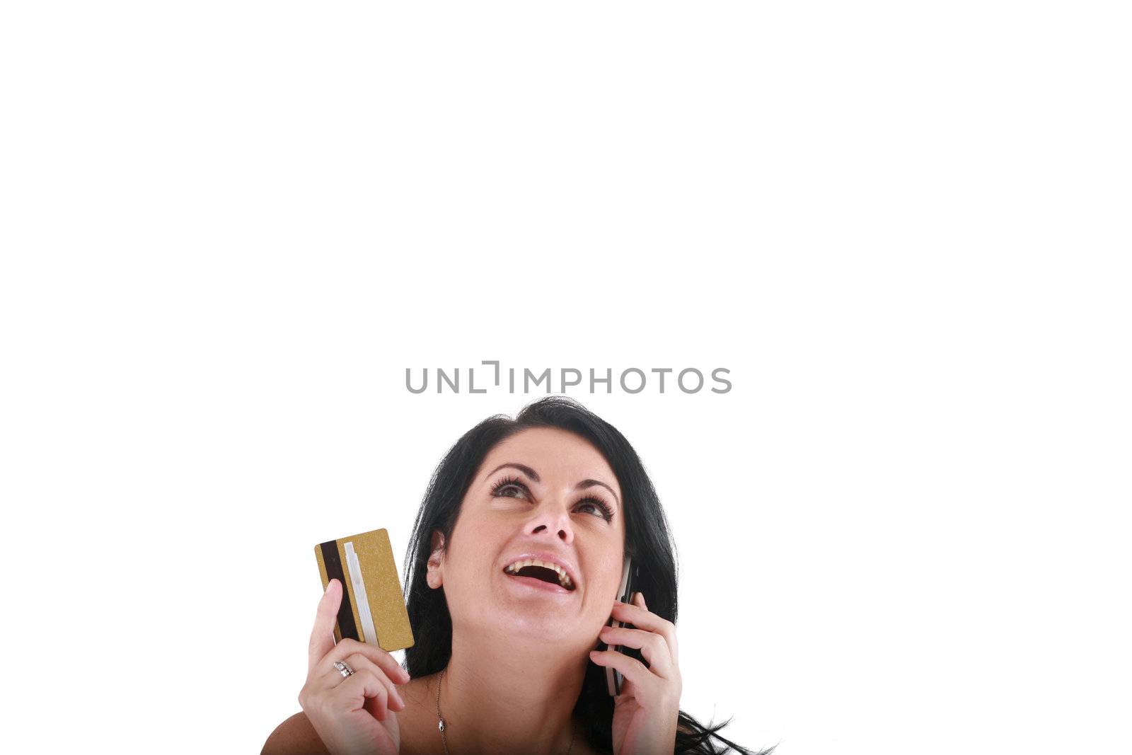 Portrait of smiling young woman using cell phone on white backgr by dacasdo