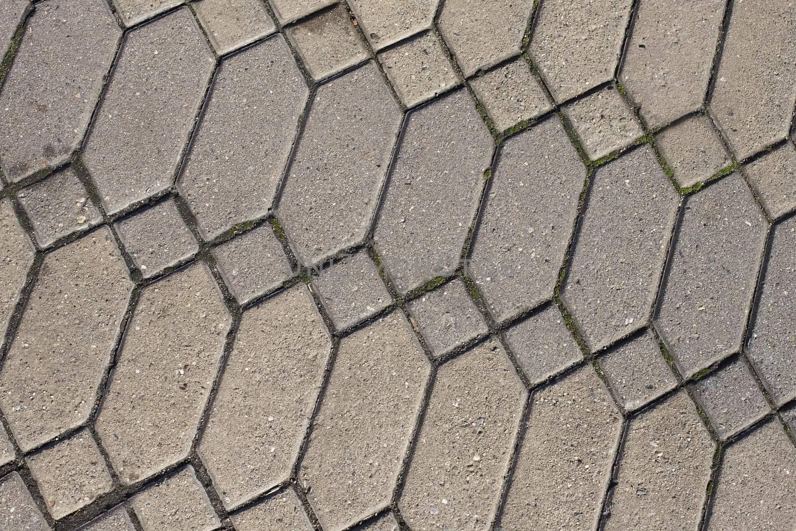 Closeup Detail of Diamond Cement Pattern in Sidewalk