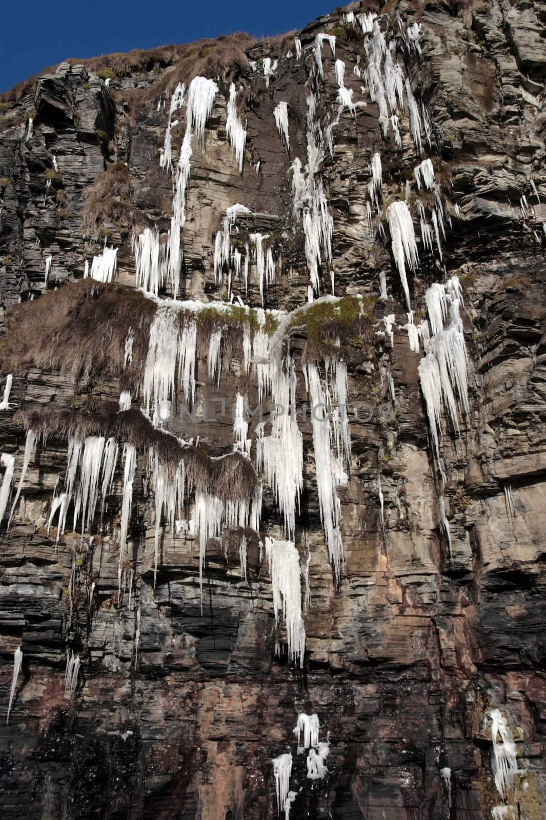 icicles on a cliff face in ballybunion ireland on a winters day