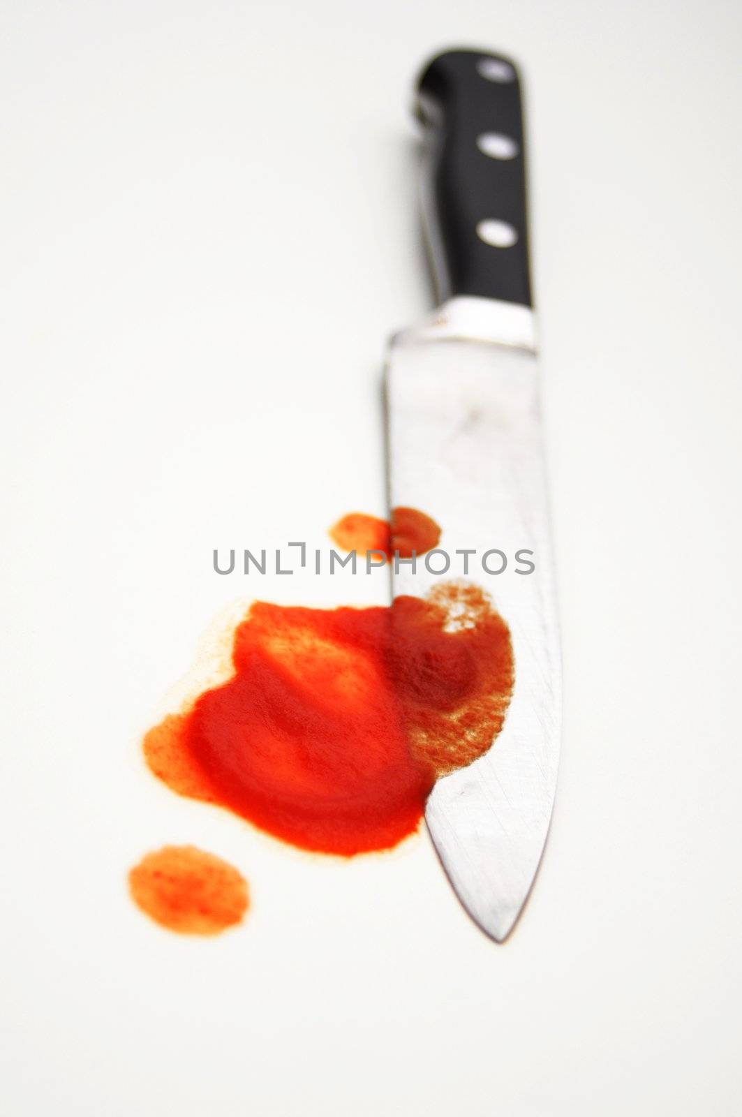 Halloween or murder crime concept with bloody knife