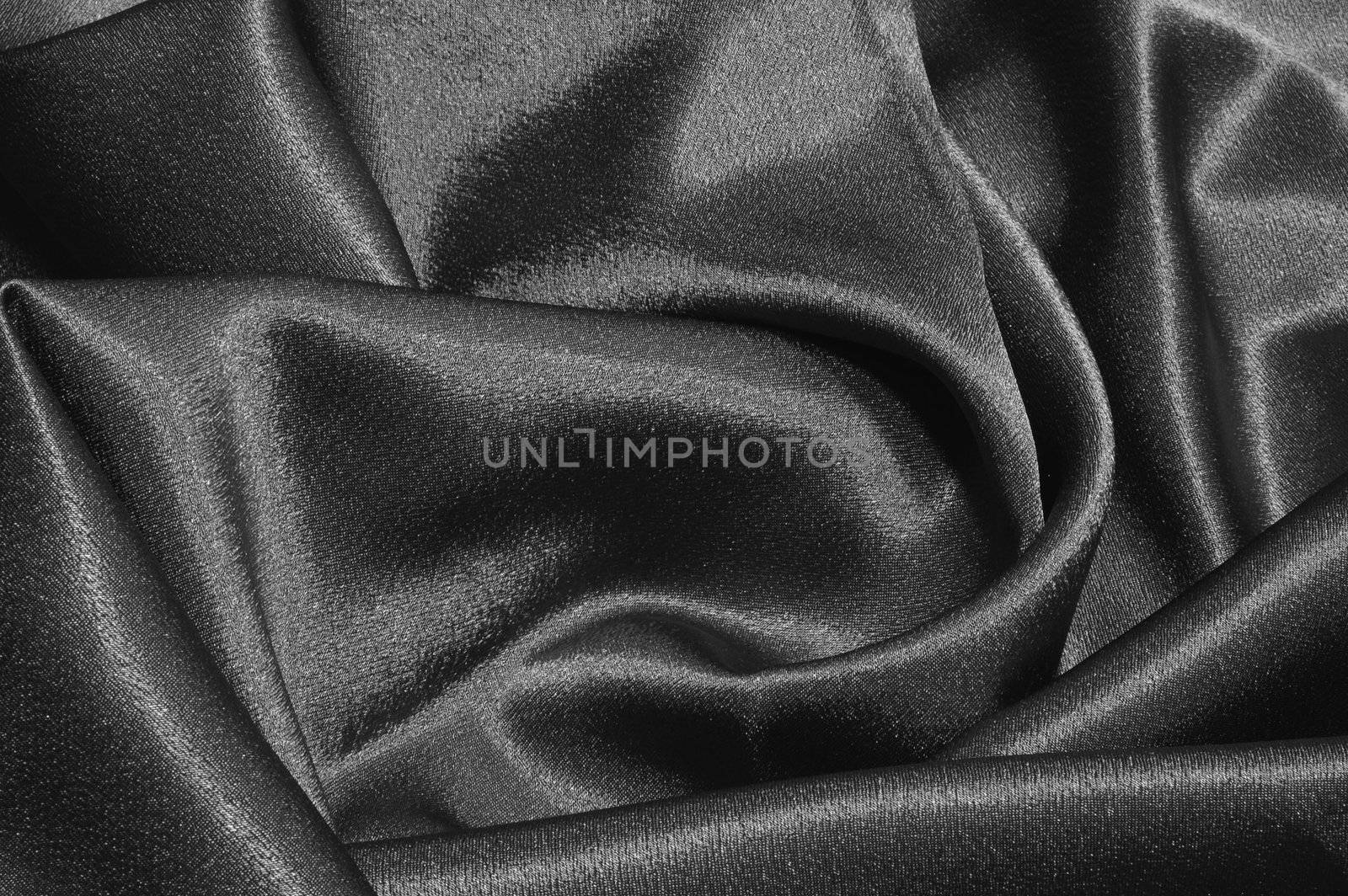 black satin or silk background with textile texture