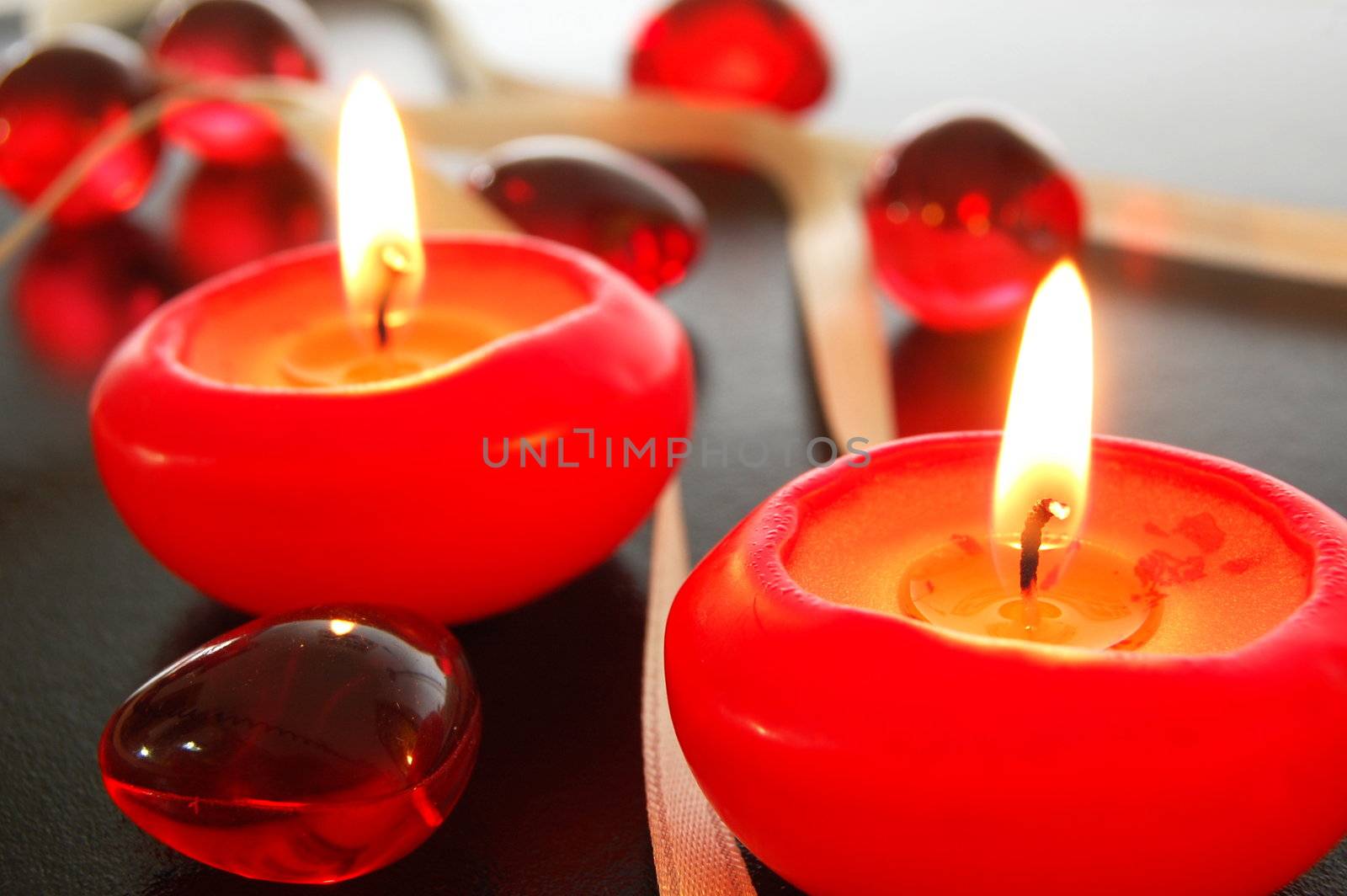 spa decoration with candles on black background