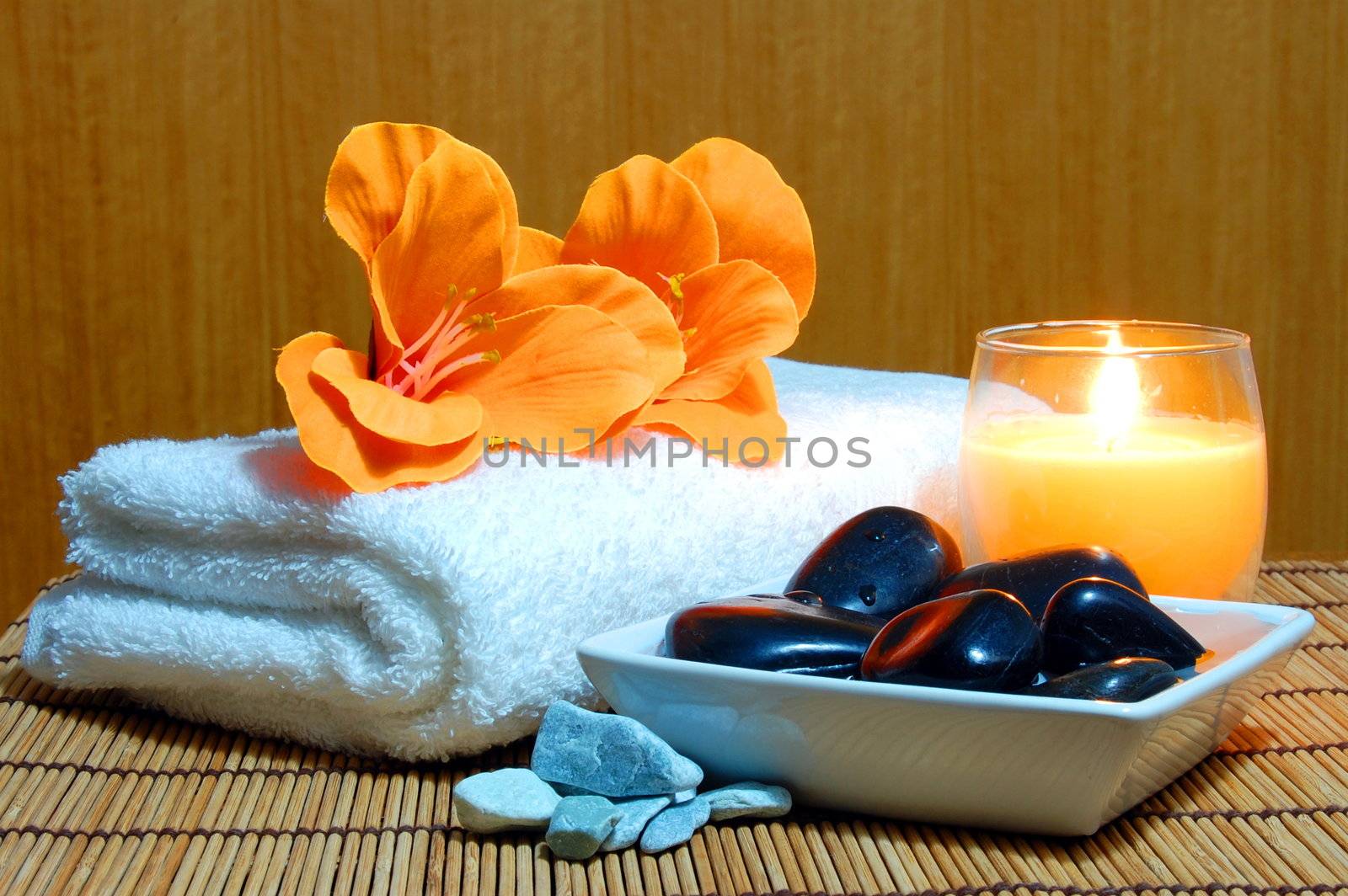 spa and wellness concept with flowers zen stones and towel