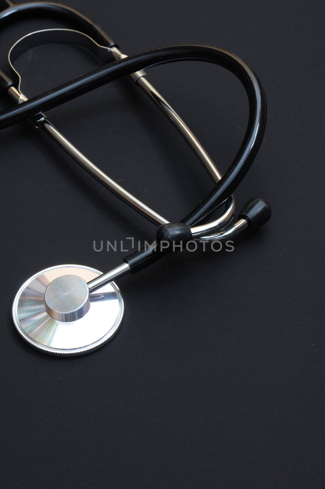 stethoscope on black by gunnar3000