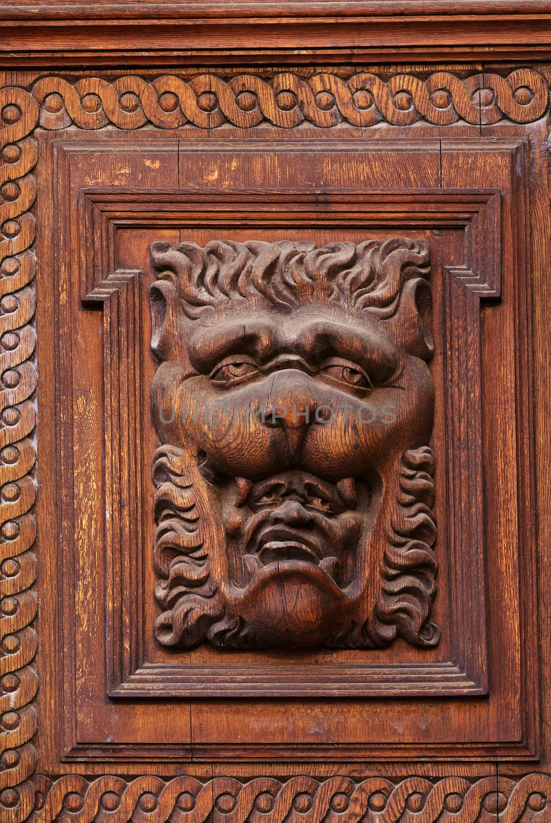 Woodcarvings. Detail of the gate on Old Town Hall in Prague.