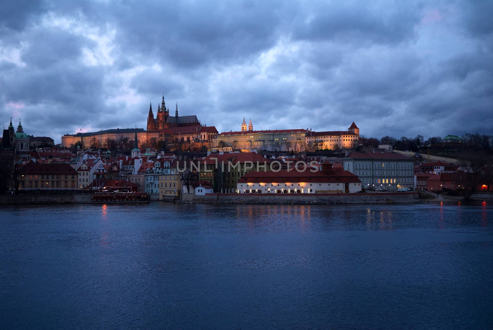 Photo of Prague. View on a old town and St.Vit cathedral. Evening