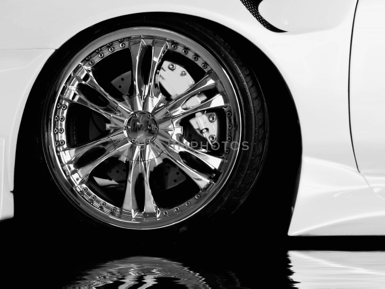 Detail of wheel section on a Japanese import modified car