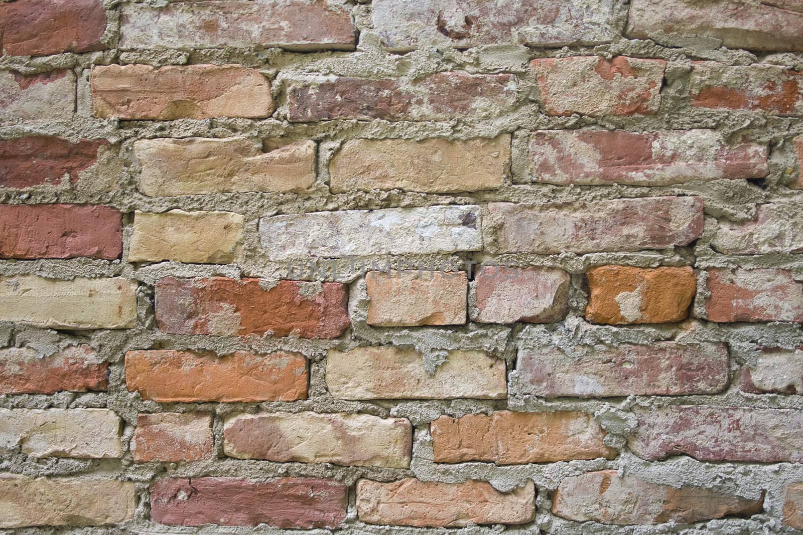 Old red brick stone wall. Textured background