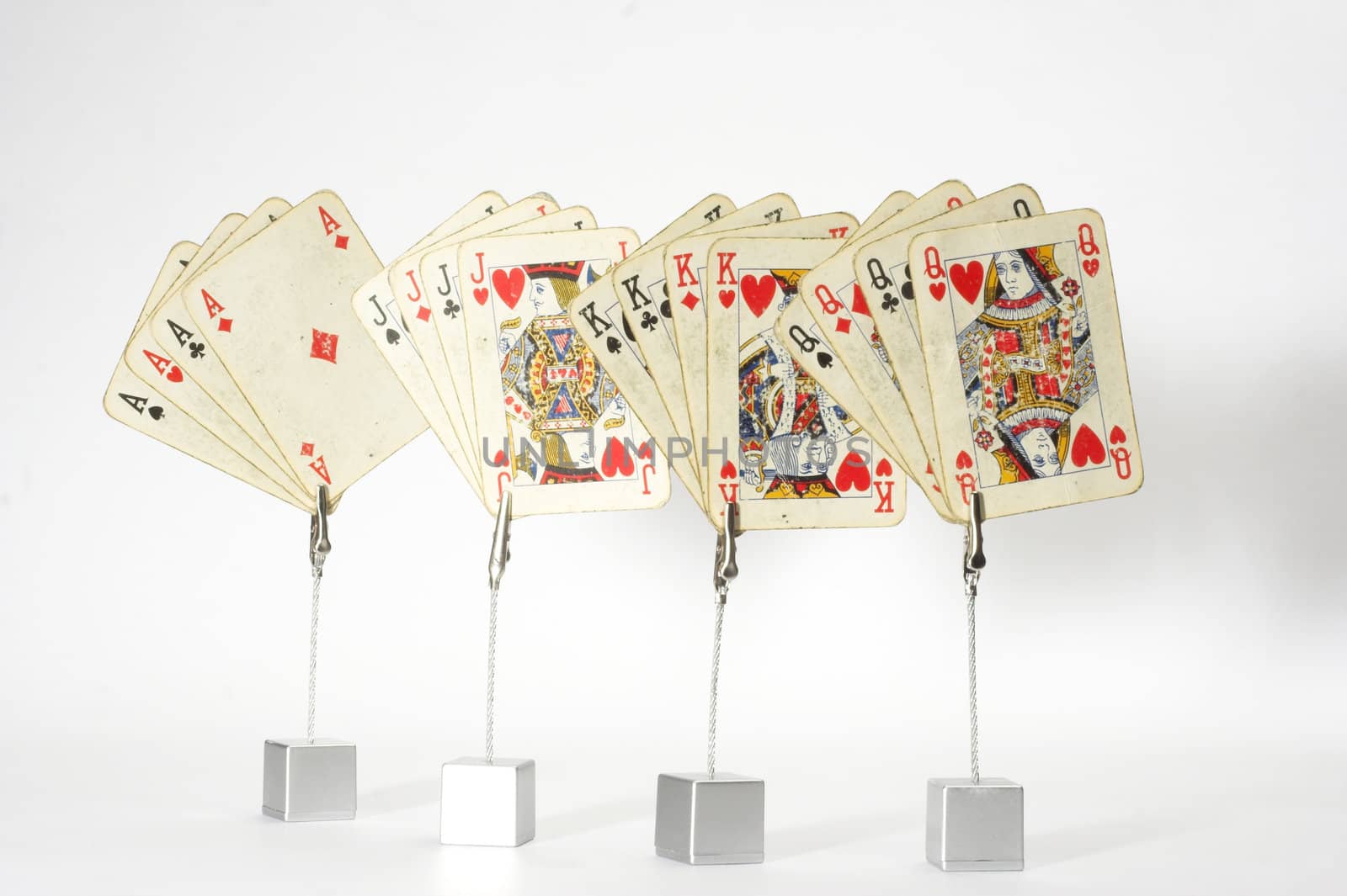 playing cards of four aces