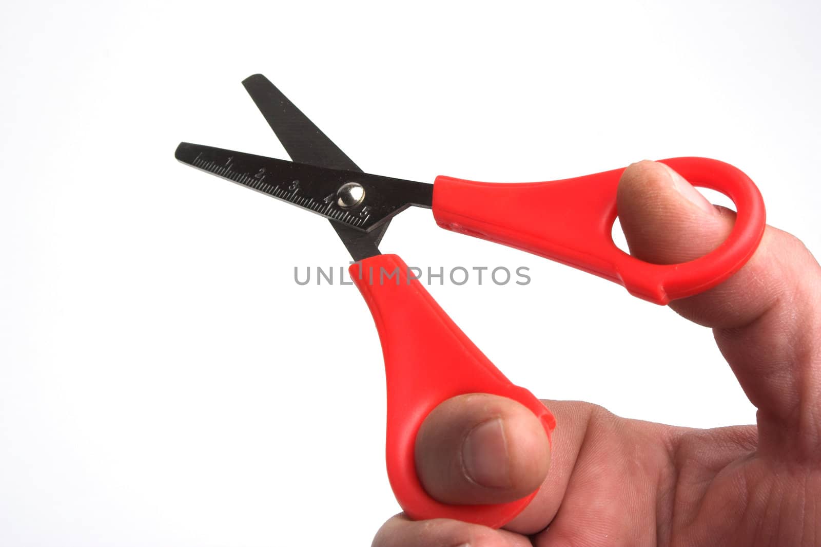  color scissors in hand over white