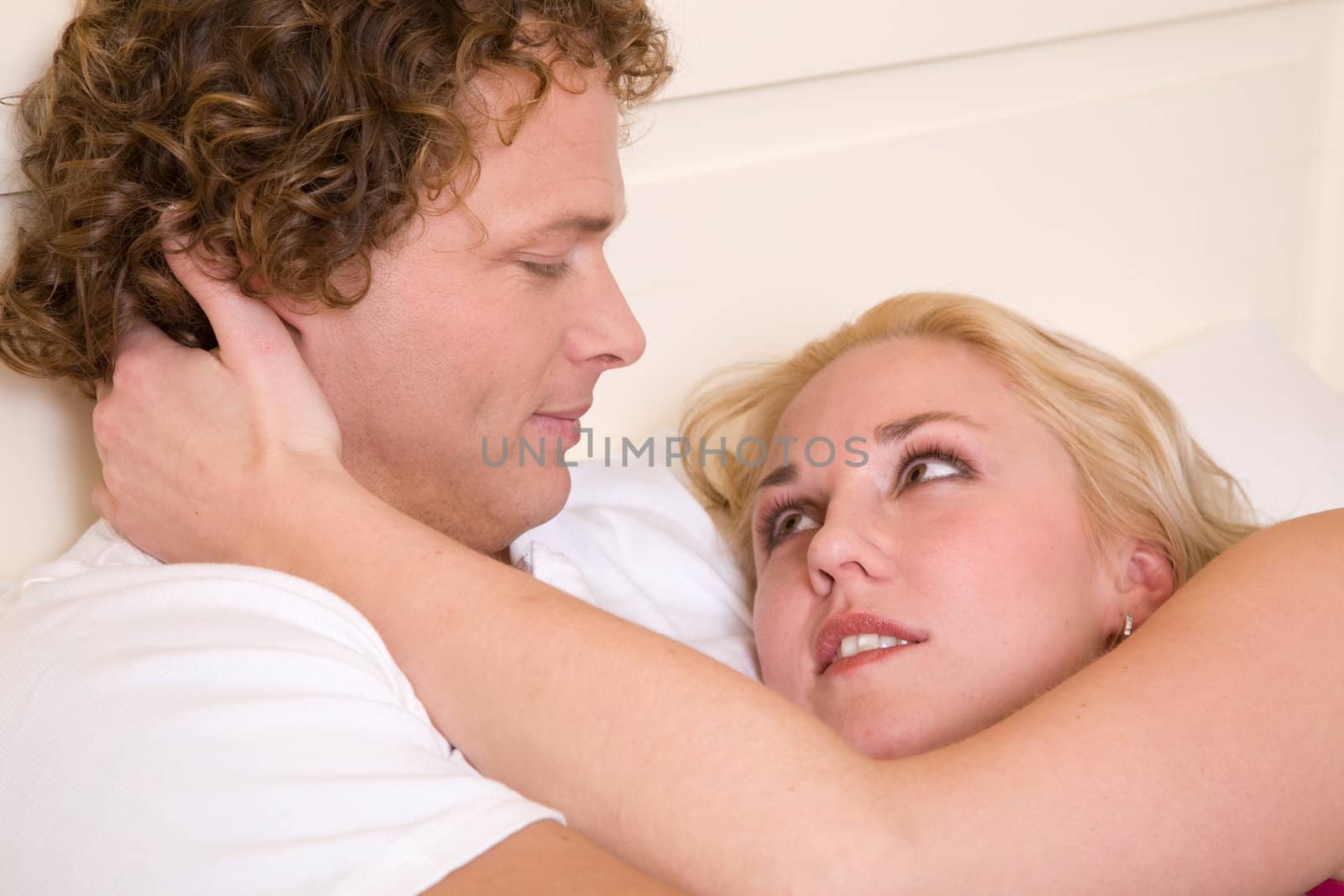 Young couple looking eachother in the eyes