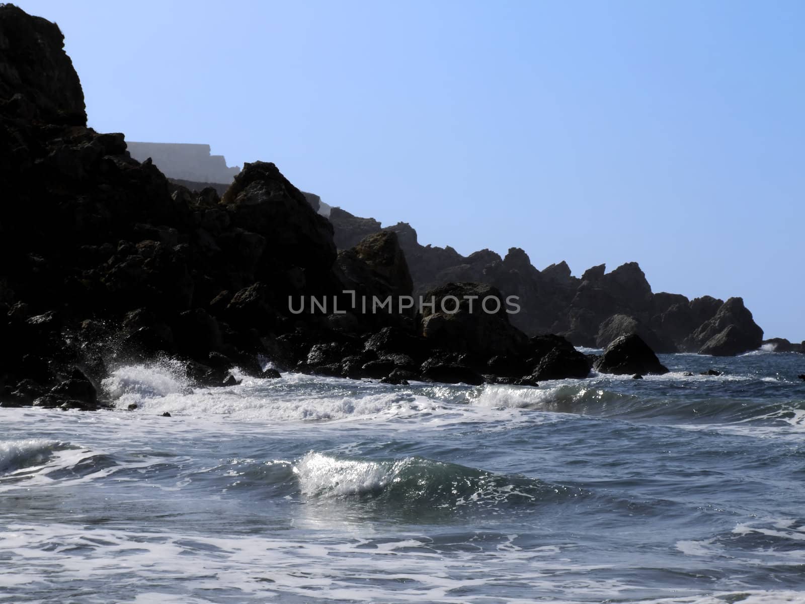 Typical rocky coastline in Malta, punctuated with sheer drops and jagged cliffs