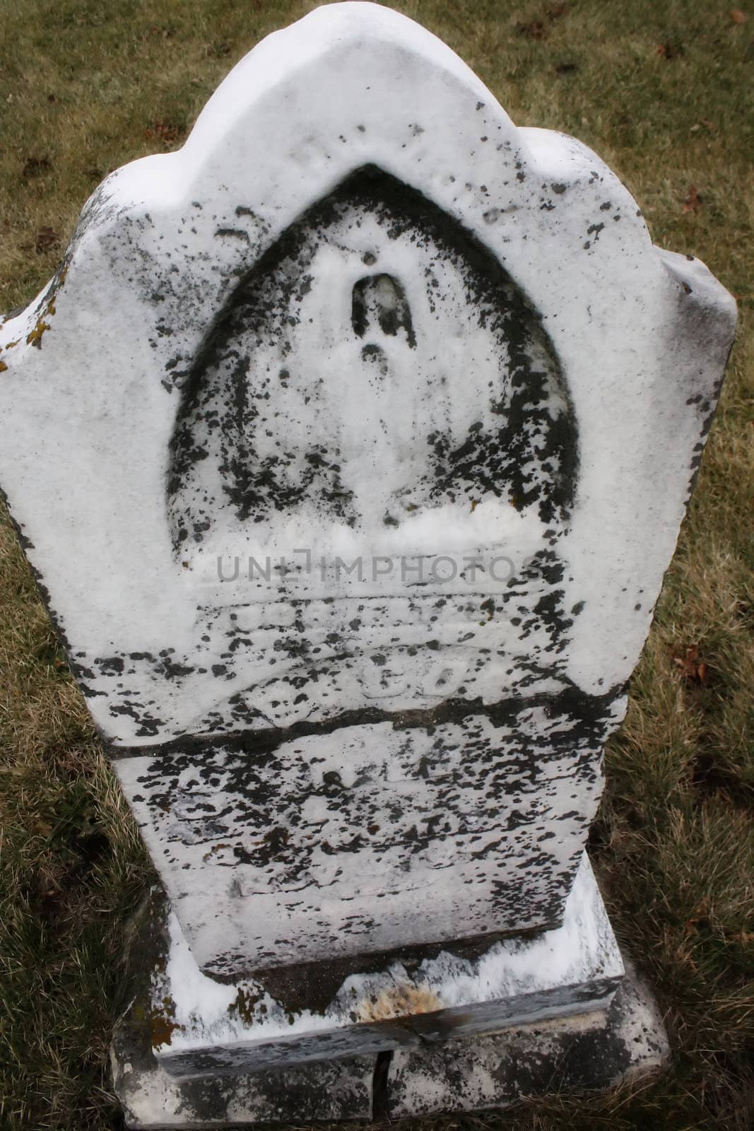 old headstone in a cemetery 