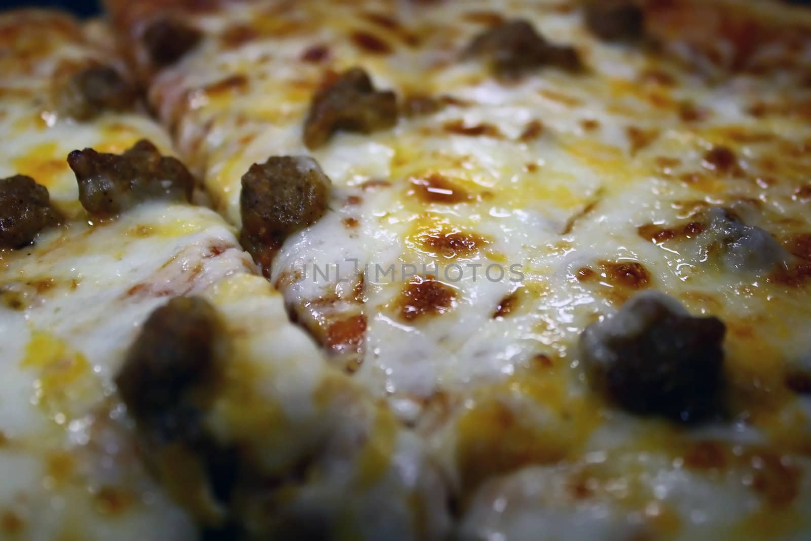 close up of a yummy sausage pizza
