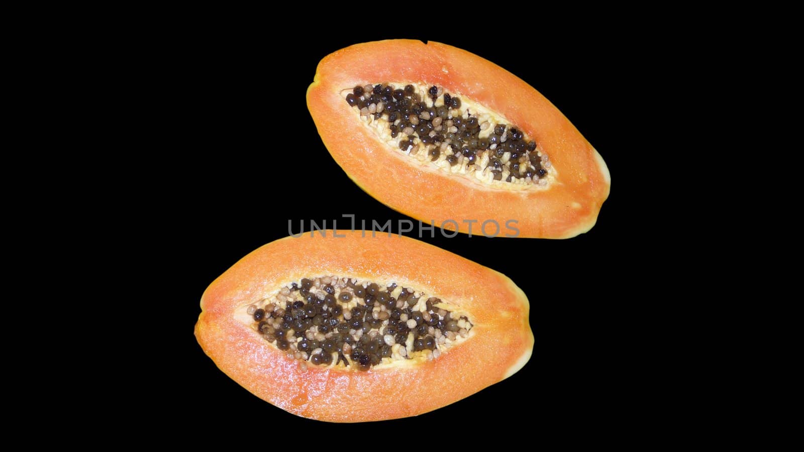 Papaya on a black background