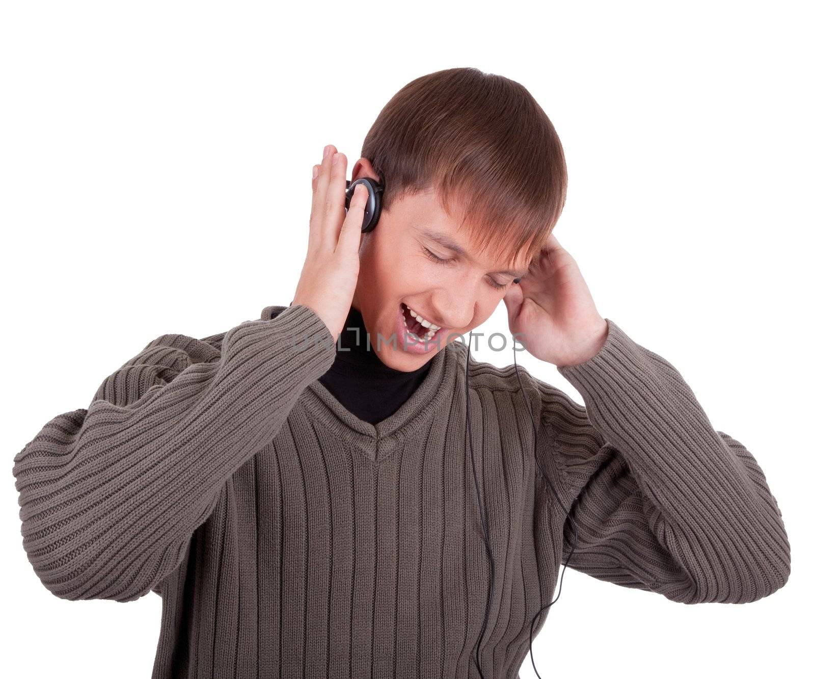 young man  listening to music with headphones