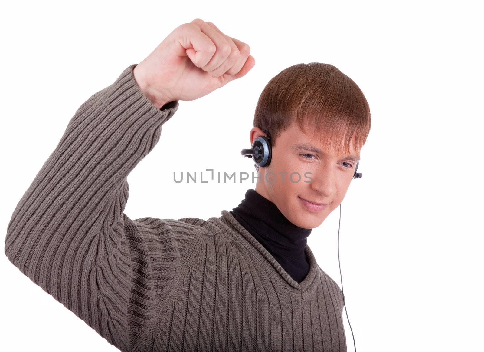 young man  listening to music with headphones