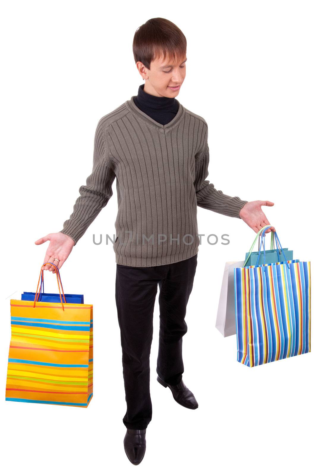 young man  handing gift bags on white background