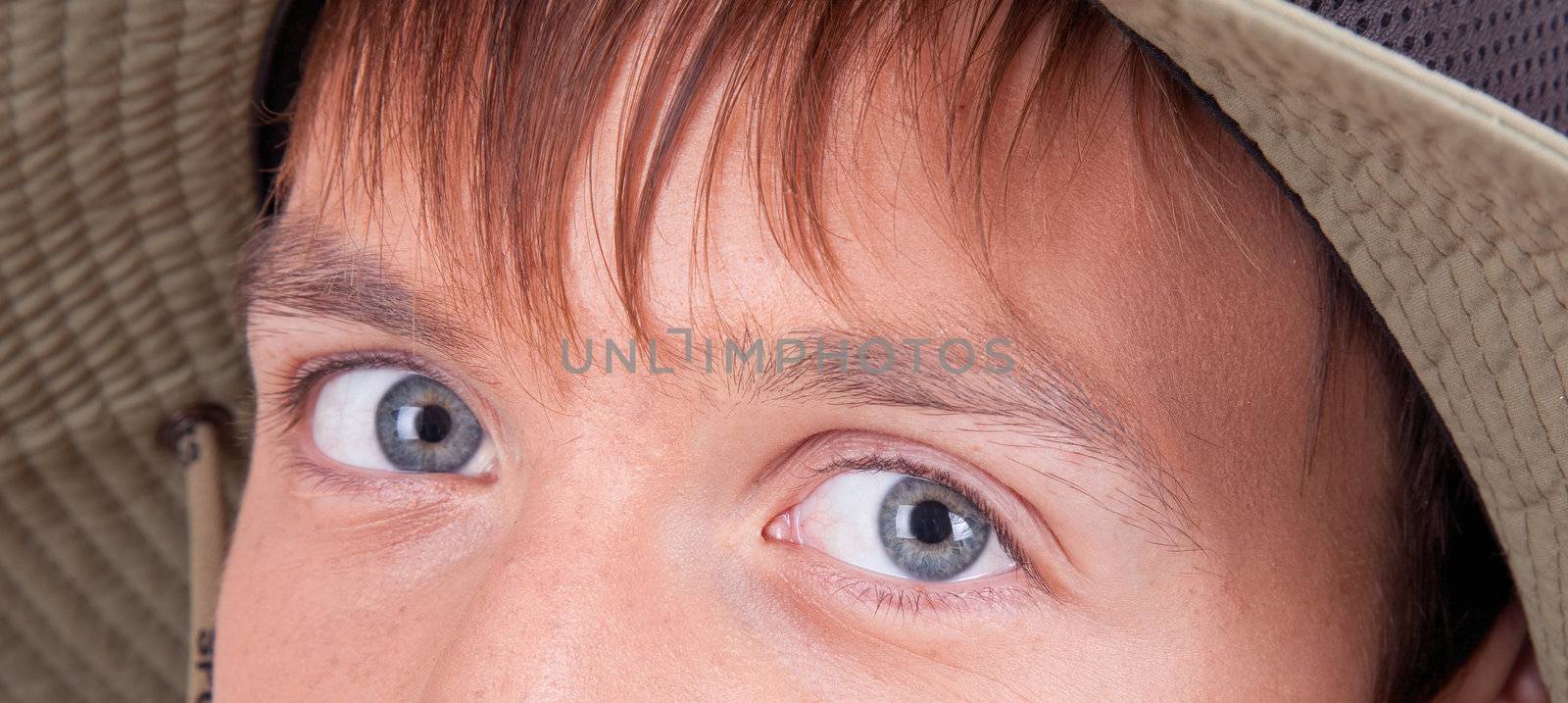 eyes of a young tourist  on white background