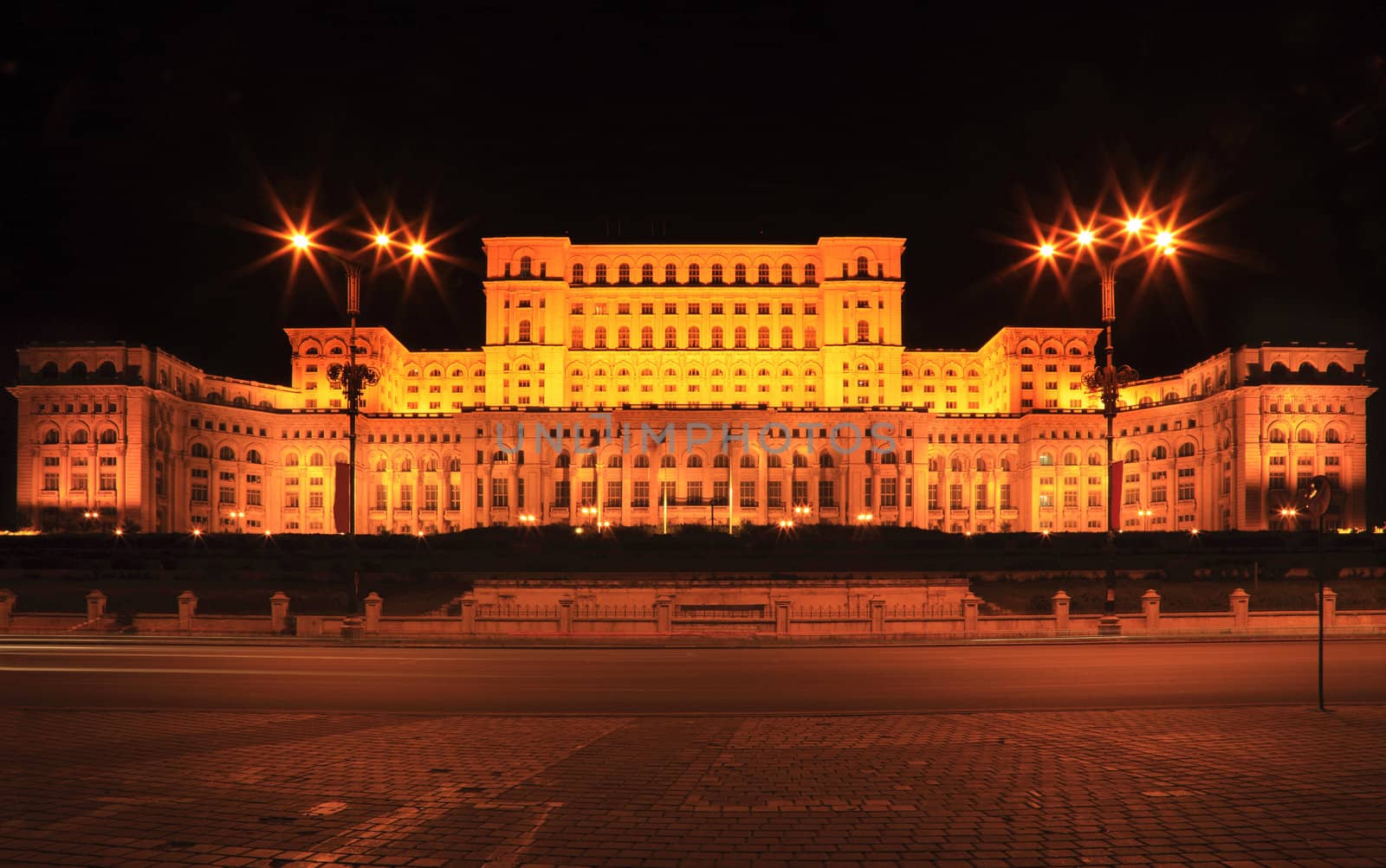 Night image of The Palace of the Parliament, also known as The People's House in the Cheauchesku's era, in Bucharest,Romania. The Palace is the world's largest civilian administrative building, The Pentagon being the largest overall. It is the most expensive and heaviest building in the world. (Wikipedia data)