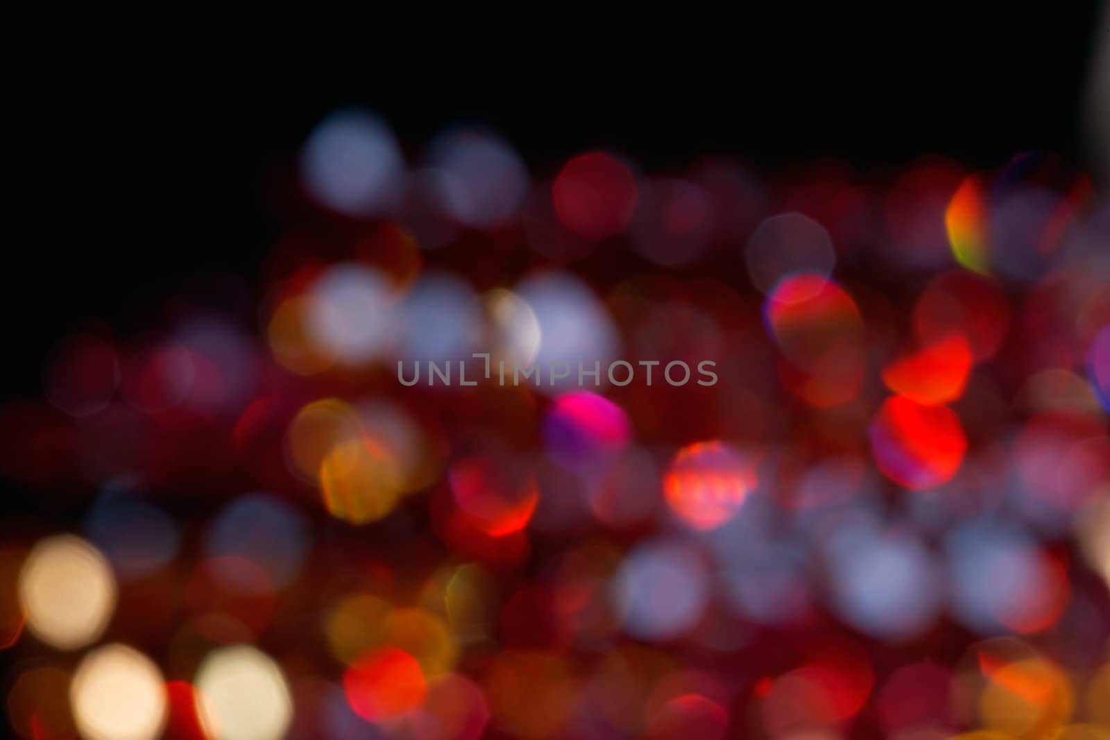 Defocus of red  lights. Image is blurry and grainy.