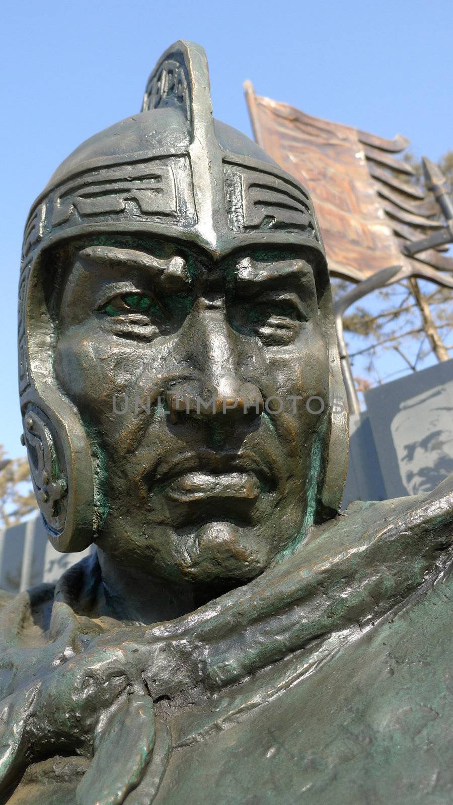 Statue of ancient Chinese warrior in helmet and armor