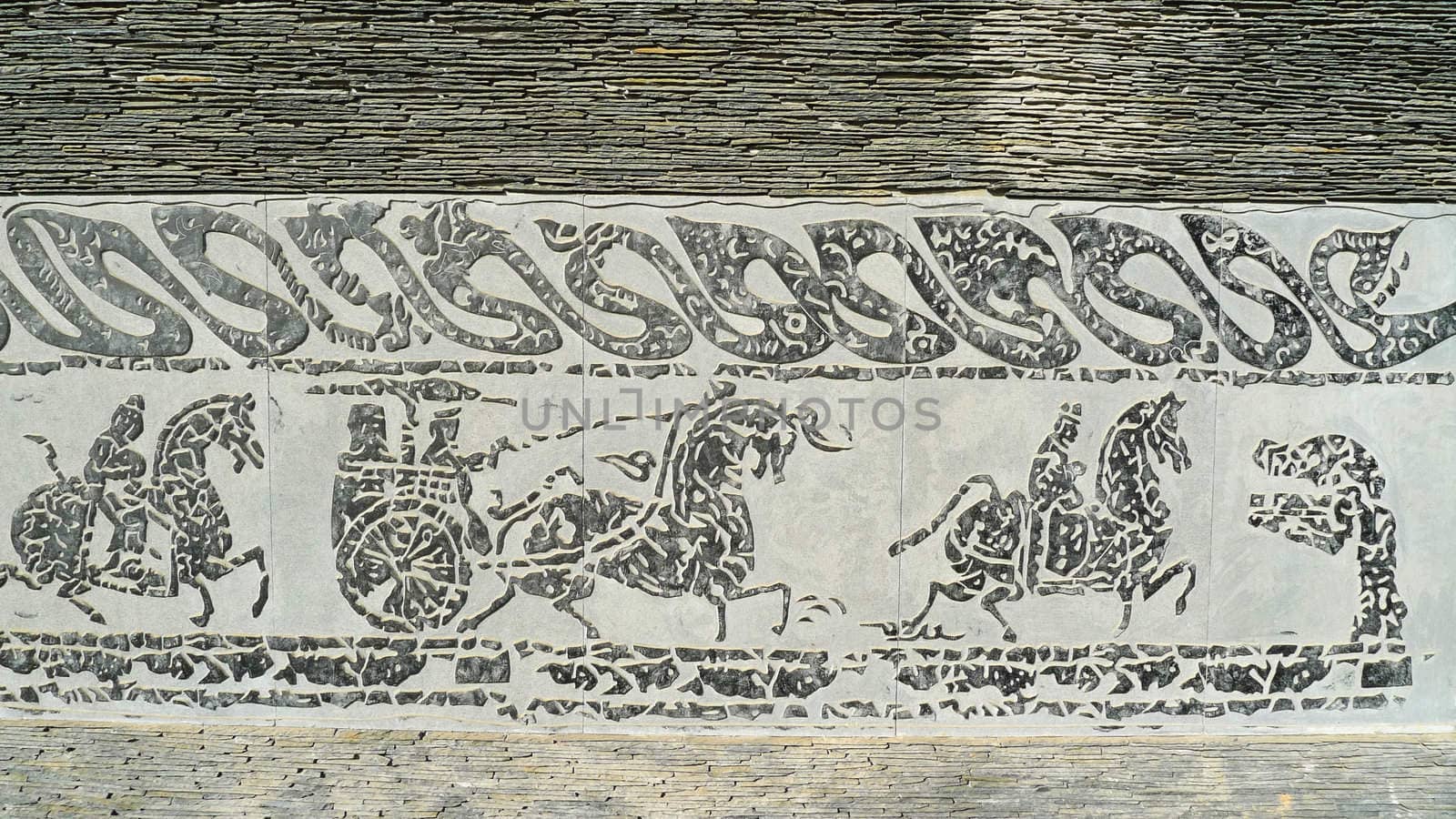 Chinese ancient rock art of vehicles and horses 