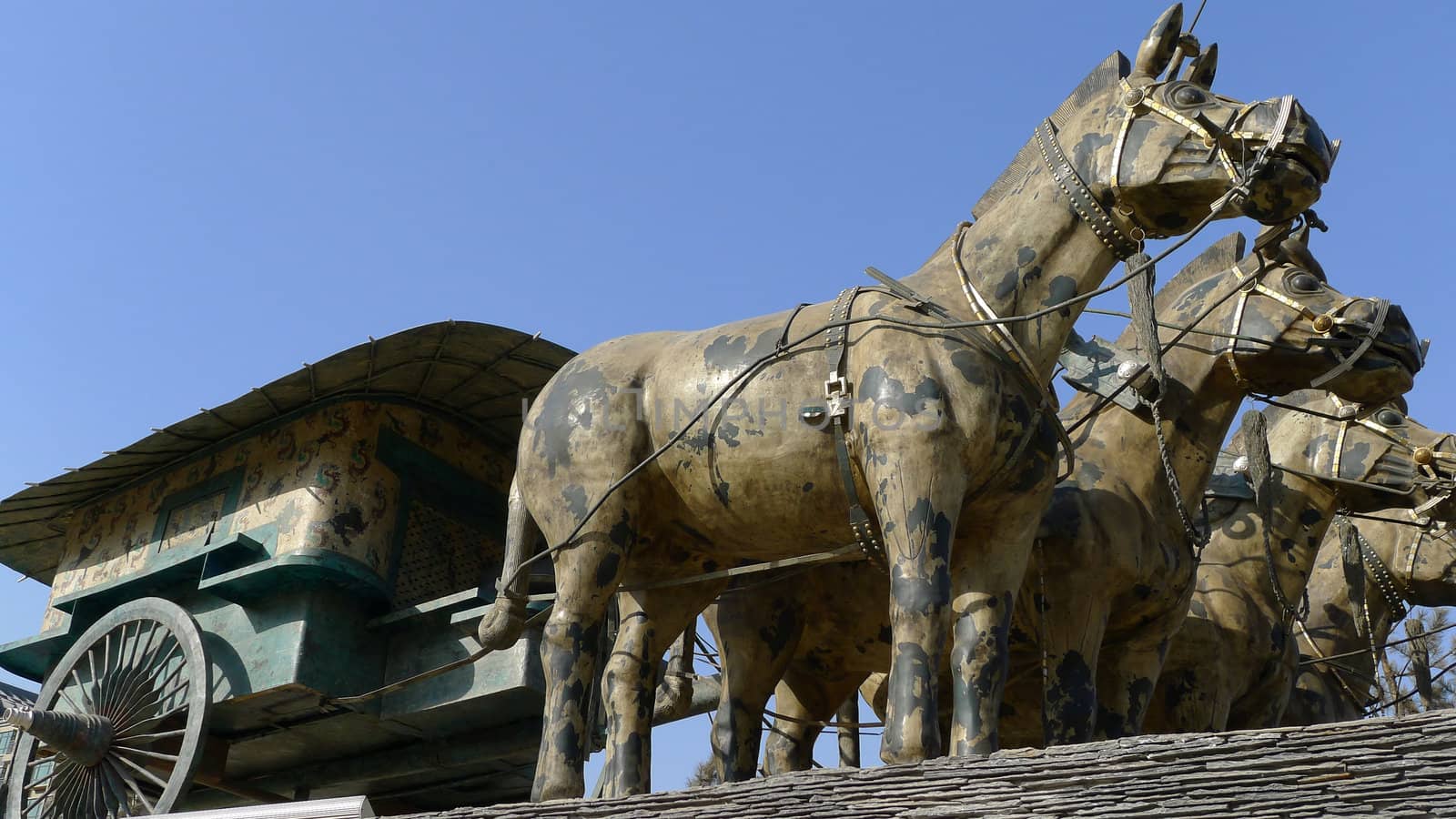 Painted ancient bronze chariots and harness in Xian China