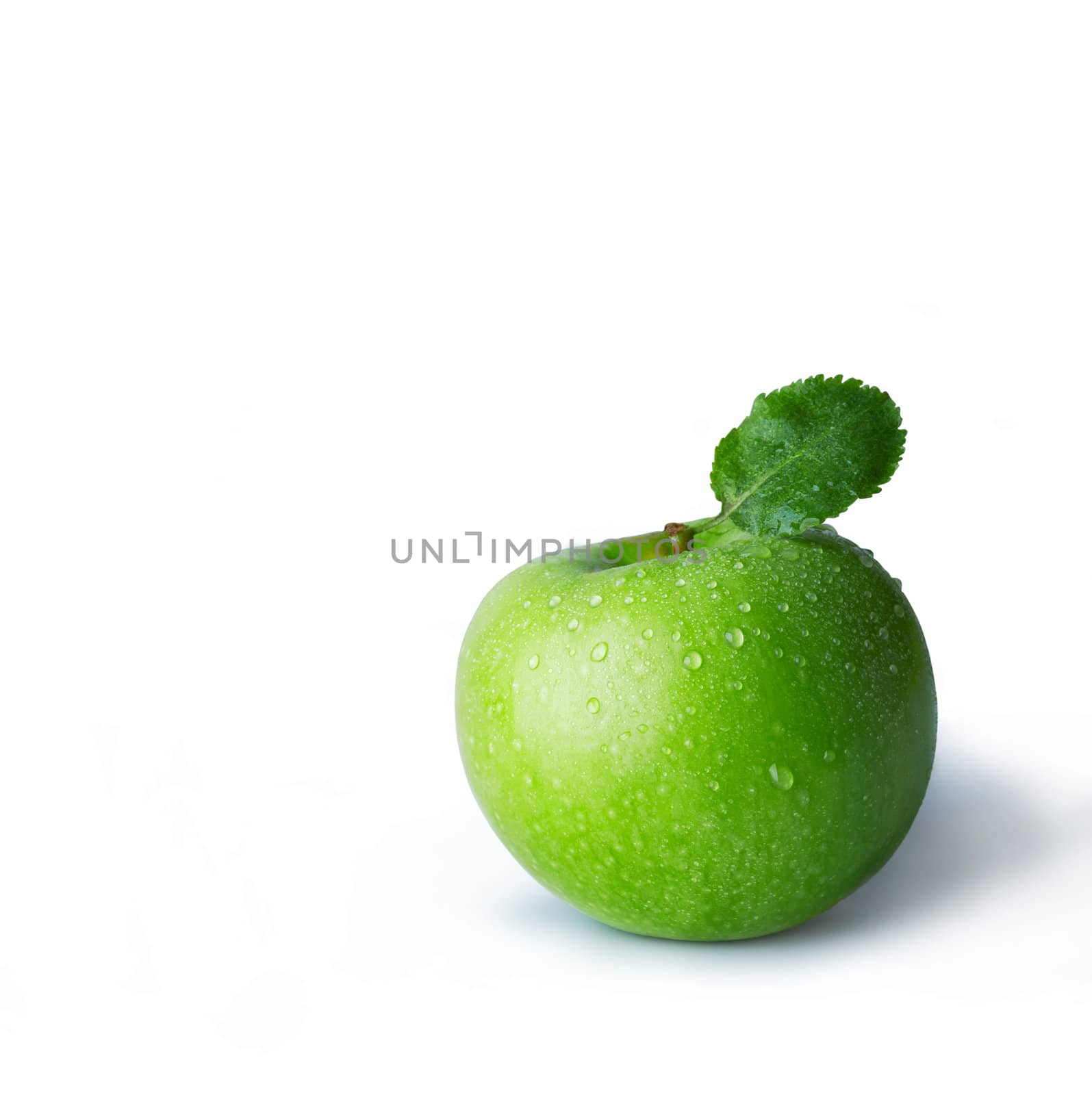 Fresh green apple with drops. The file includes a clipping path.  Professionally retouched high quality image.