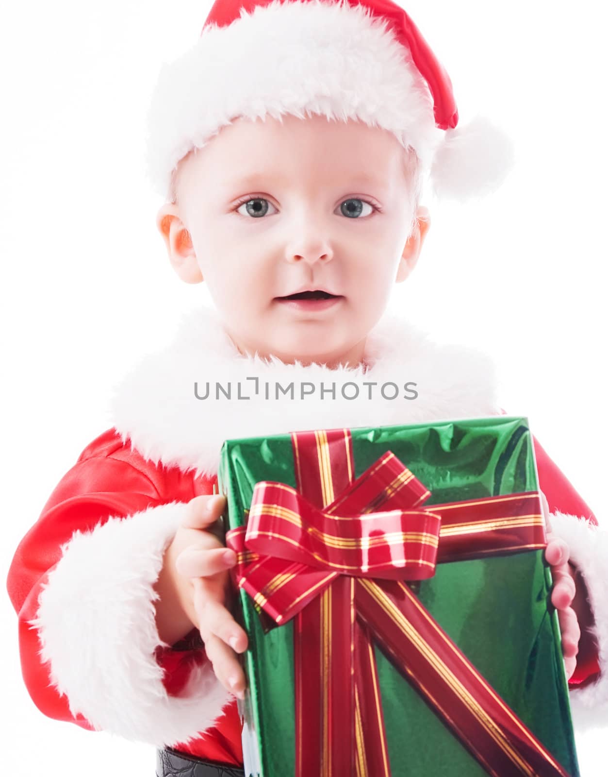 Beautiful toddler Santa with Christmas gift by rozhenyuk