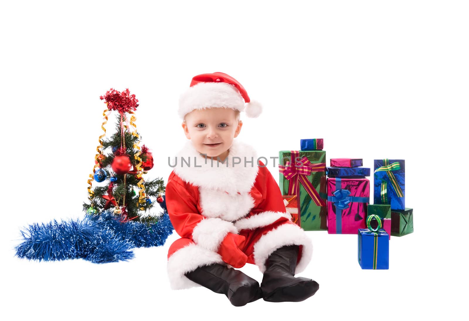 Beautiful toddler Santa with Christmas decorations