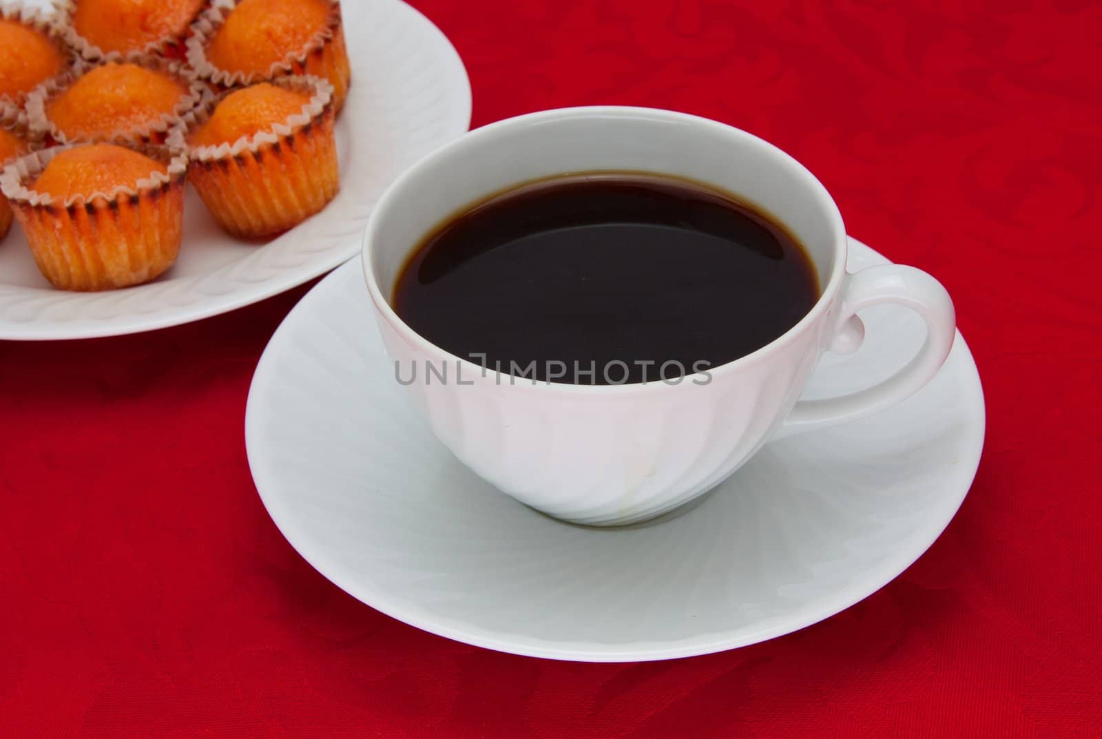 Coffee cup over red background